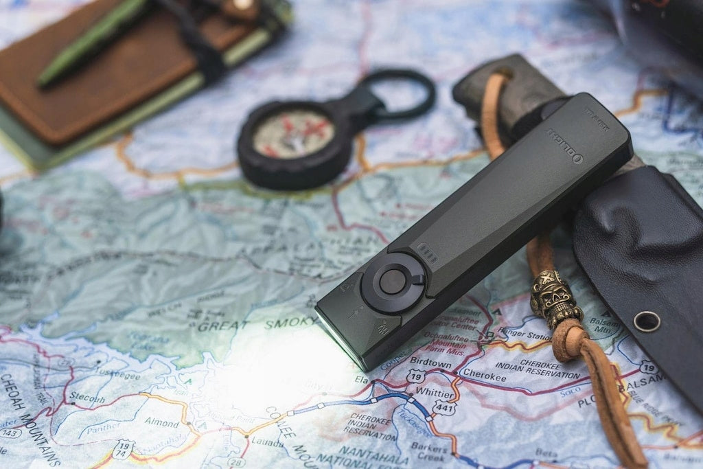 Latarka akumulatorowa EDC ze wskaźnikiem Olight Arkfeld Ultra UV 1400 lm
