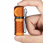 Latarka czołowa i kątowa Olight Perun 2 Mini Kit Orange z opaską - 1100 lm