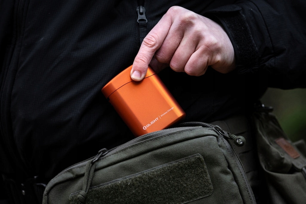 Latarka czołowa kątowa Olight Perun 3 Mini Premium Orange z opaską 1250 lm
