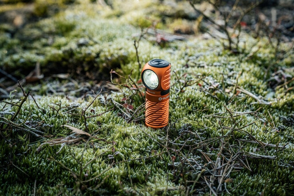 Latarka czołowa kątowa Olight Perun 3 Mini Premium Orange z opaską 1250 lm