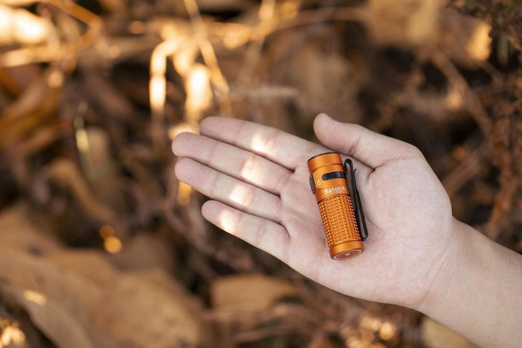 Latarka klasyczna LED Olight Baton 4 pomarańczowa 1300lm 170m 30 dni